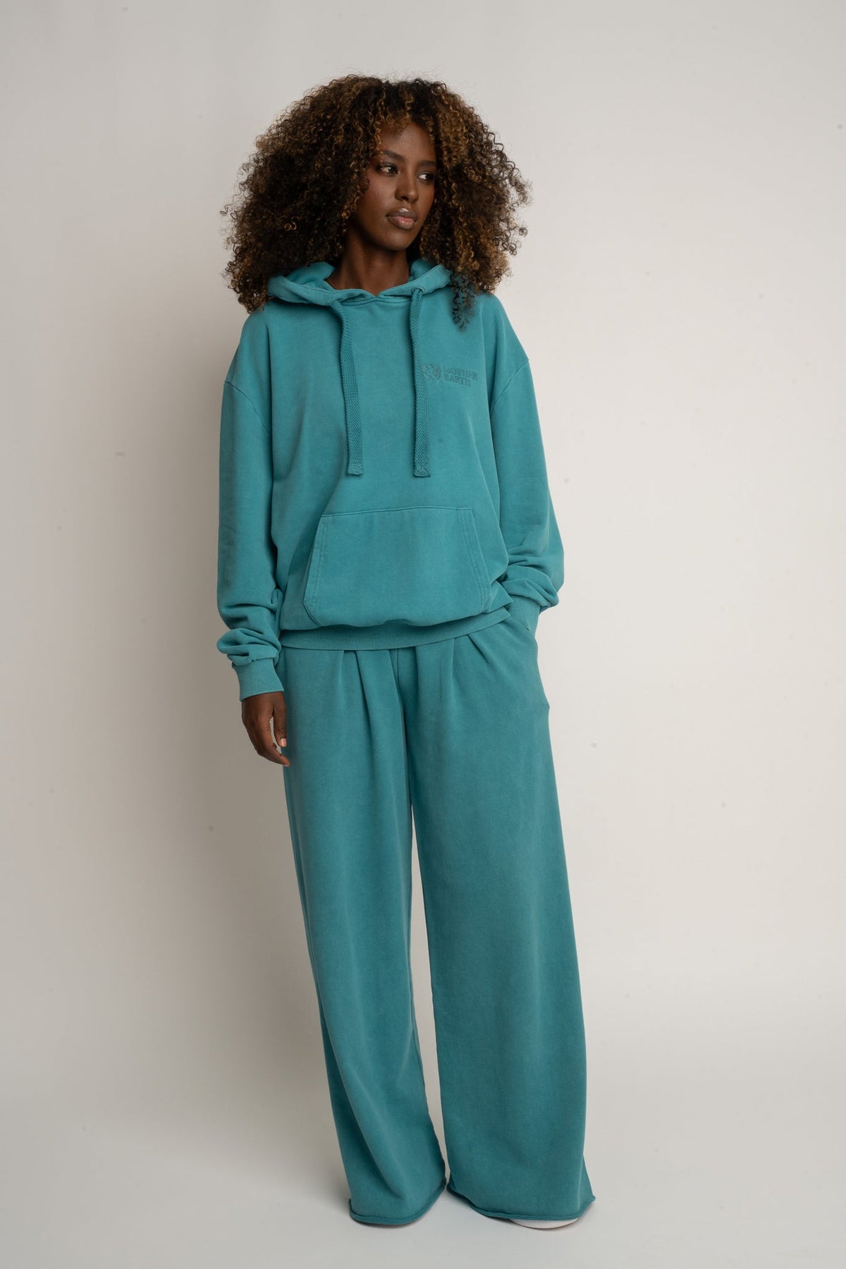 BLUZA Z KAPTUREM Z EFEKTEM WASHED  TURKUSOWA - LAPLAND